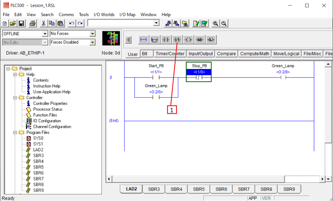 PLCLogix 500 rung showing Stop_PB entered after the seal-in branch using a normally closed instruction